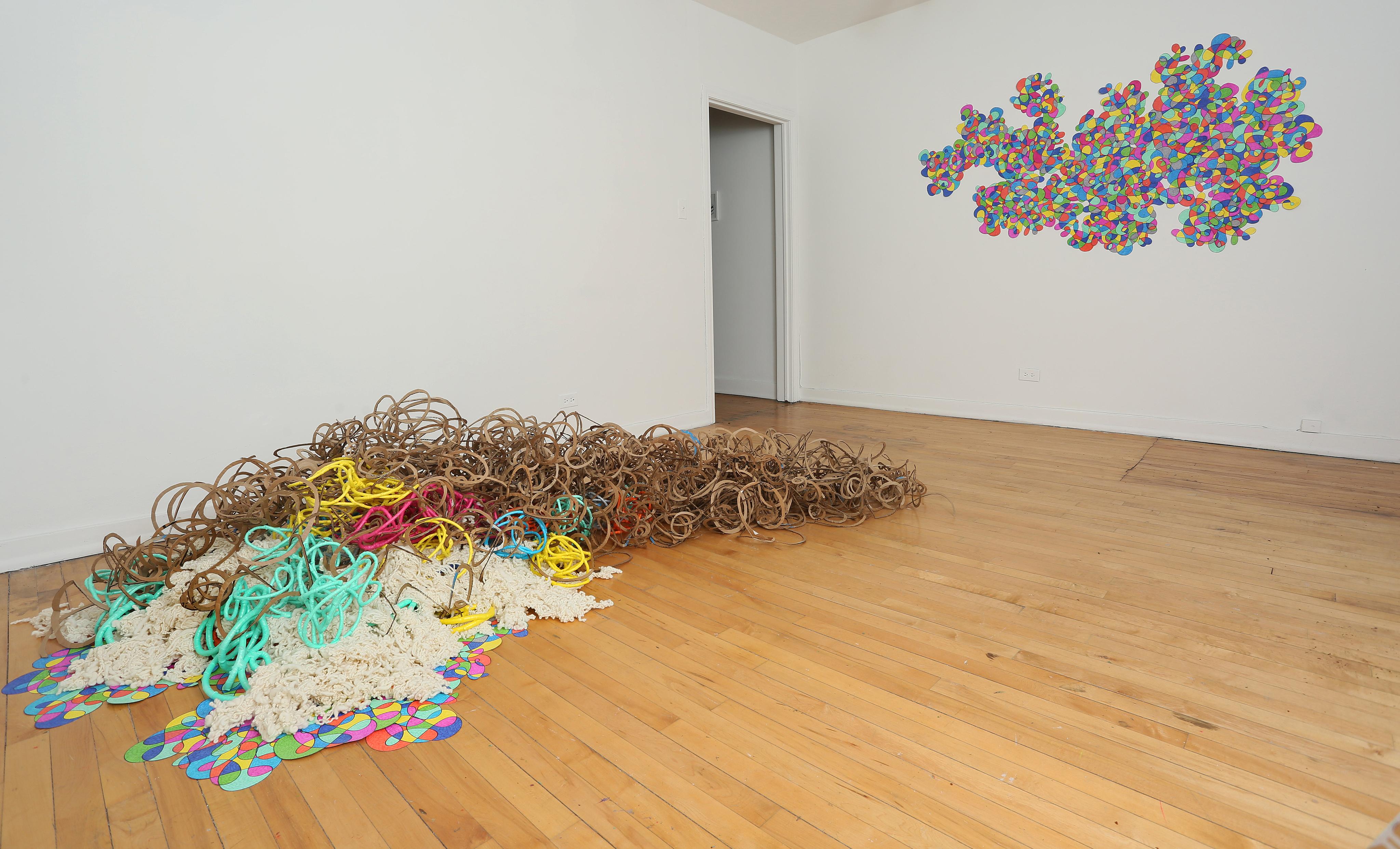 The Spaces in Between (wall) and There's Stillness in the Chaos (floor)